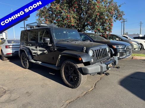 Used 2014 Jeep Wrangler Unlimited Sahara AWD/4WD image 1