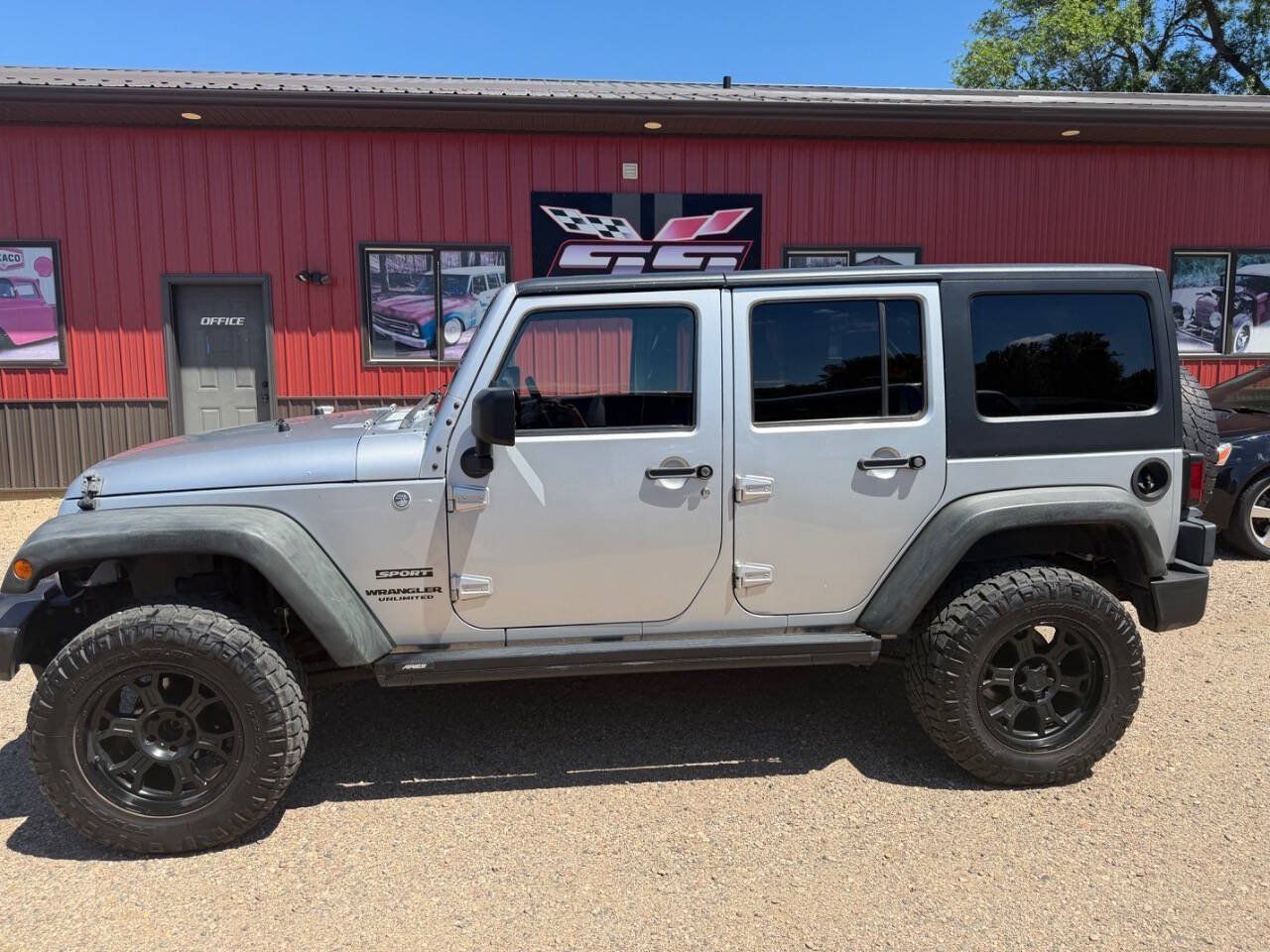 Used 2011 Jeep Wrangler Unlimited Sport AWD/4WD image 1
