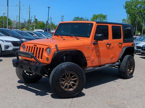 Used 2013 Jeep Wrangler Unlimited Sport AWD/4WD image 1