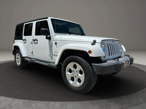 Used 2014 Jeep Wrangler Unlimited Sahara w/ Dual Top Group AWD/4WD image 3