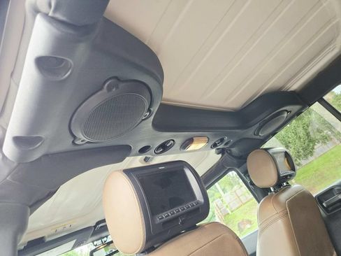 Used 2013 Jeep Wrangler Unlimited Sahara w/ Dual Top Group AWD/4WD image 14