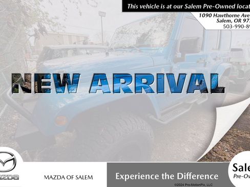 Used 2014 Jeep Wrangler Unlimited Sahara AWD/4WD image 1