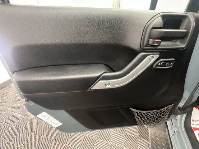 Used 2014 Jeep Wrangler Unlimited Sahara w/ Dual Top Group AWD/4WD image 13