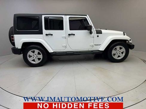 Used 2013 Jeep Wrangler Unlimited Sahara w/ Dual Top Group AWD/4WD image 6
