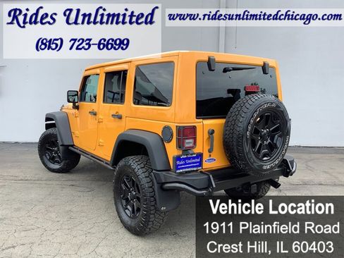 Used 2013 Jeep Wrangler Unlimited Sahara w/ Dual Top Group AWD/4WD image 3