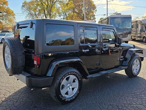 Used 2011 Jeep Wrangler Unlimited Sahara w/ Dual Top Group image 2