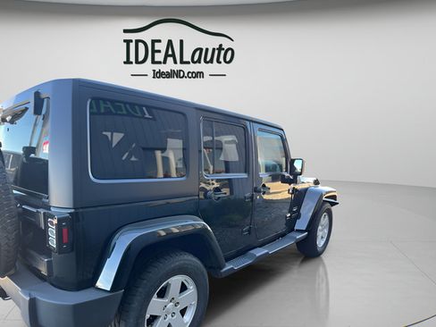 Used 2012 Jeep Wrangler Unlimited Sahara w/ Dual Top Group AWD/4WD image 2