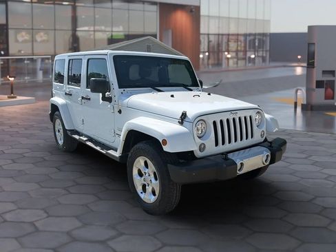 Used 2015 Jeep Wrangler Unlimited Sahara w/ Mopar Chrome Edition Group AWD/4WD image 21
