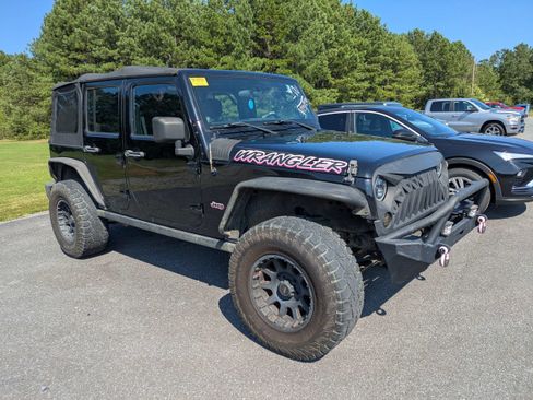 Used 2012 Jeep Wrangler Unlimited Sport w/ Connectivity Group AWD/4WD image 1
