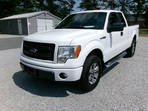 Used 2013 Ford F150 STX w/ Mid Equipment Group AWD/4WD image 1