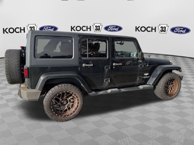 Used 2014 Jeep Wrangler Unlimited Sahara w/ Dual Top Group AWD/4WD image 8