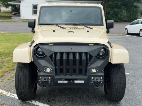Used 2012 Jeep Wrangler Unlimited Sahara w/ Dual Top Group AWD/4WD image 2