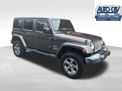 Used 2016 Jeep Wrangler Unlimited Sahara w/ Dual Top Group AWD/4WD image 34