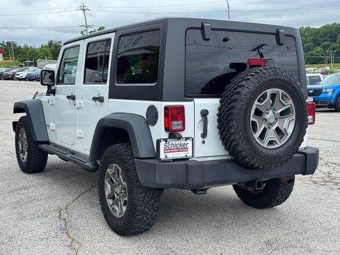 Used 2014 Jeep Wrangler Unlimited Rubicon w/ Dual Top Group AWD/4WD image 6