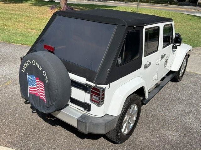 Used 2013 Jeep Wrangler Unlimited Sahara w/ Dual Top Group AWD/4WD image 23