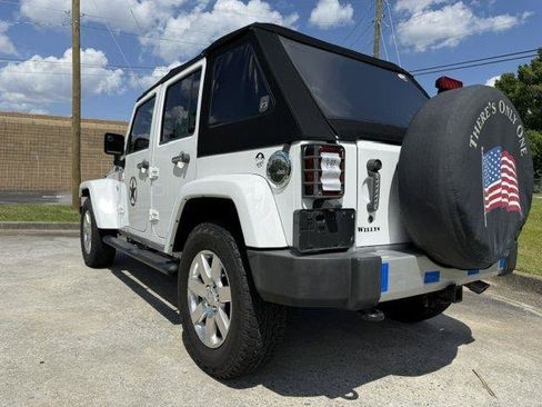 Used 2013 Jeep Wrangler Unlimited Sahara w/ Dual Top Group AWD/4WD image 5