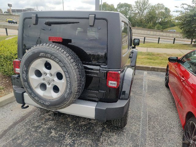 Used 2014 Jeep Wrangler Unlimited Sahara w/ Dual Top Group AWD/4WD image 14