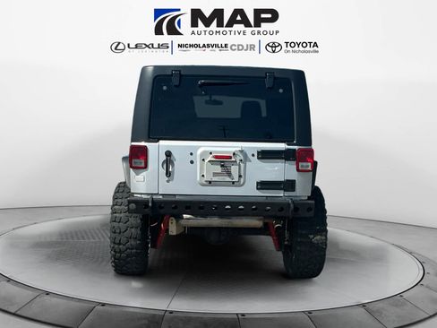 Used 2010 Jeep Wrangler Unlimited Rubicon w/ Dual Top Group image 4