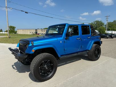 Used 2014 Jeep Wrangler Unlimited Sahara w/ Dual Top Group