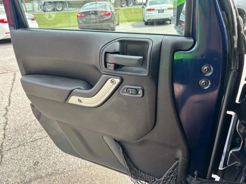 Used 2013 Jeep Wrangler Unlimited Sahara w/ Dual Top Group image 26