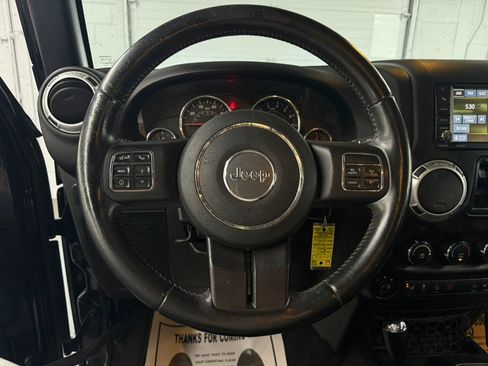 Used 2015 Jeep Wrangler Unlimited Rubicon w/ Dual Top Group AWD/4WD image 21