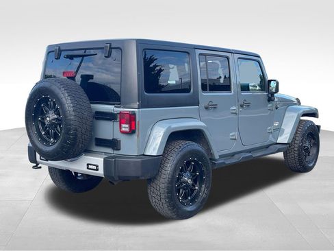 Used 2014 Jeep Wrangler Unlimited Sahara w/ Dual Top Group AWD/4WD image 7