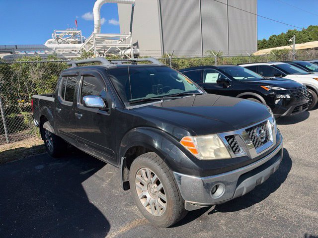 Used 2011 Nissan Frontier SL AWD/4WD image 1