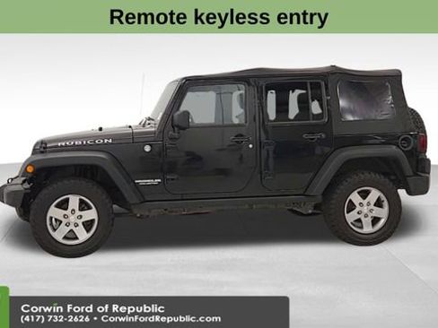 Used 2011 Jeep Wrangler Unlimited Rubicon w/ Dual Top Group image 4