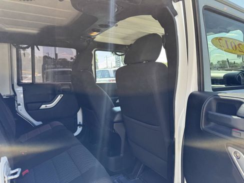 Used 2012 Jeep Wrangler Unlimited Sahara w/ Dual Top Group AWD/4WD image 30