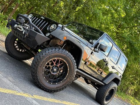 Used 2015 Jeep Wrangler Unlimited Rubicon w/ Dual Top Group AWD/4WD image 4