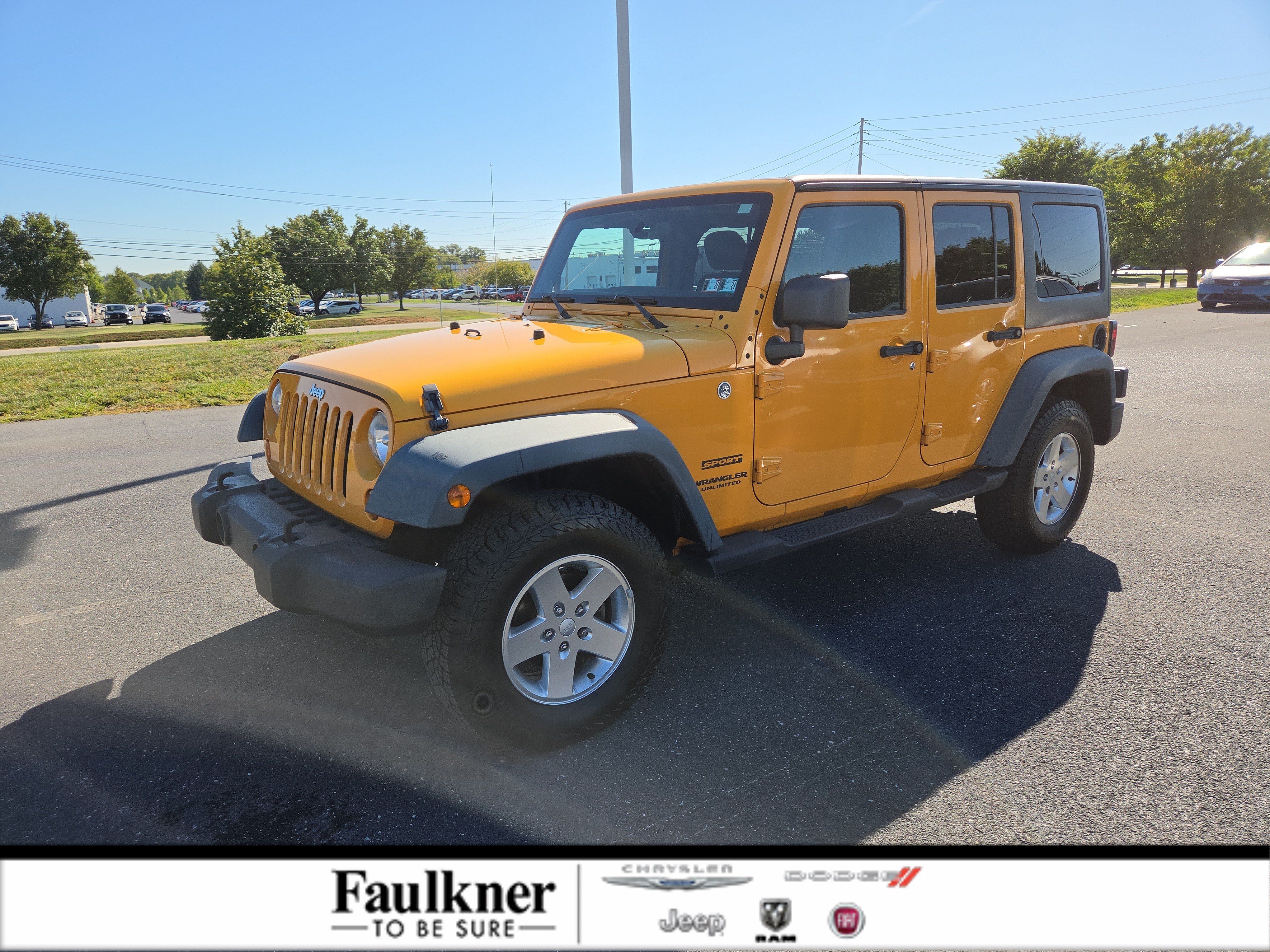 Used 2012 Jeep Wrangler Unlimited Sport AWD/4WD image 1