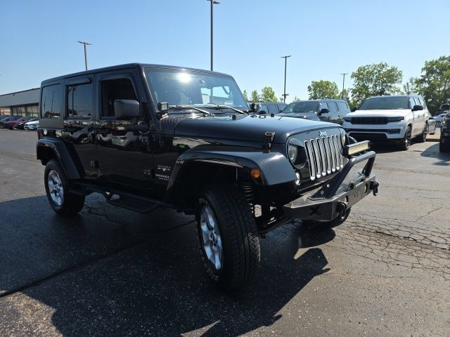 Used 2016 Jeep Wrangler Unlimited Sahara w/ Dual Top Group AWD/4WD image 9