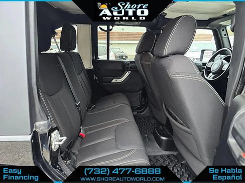 Used 2014 Jeep Wrangler Unlimited Sahara w/ Dual Top Group AWD/4WD image 21