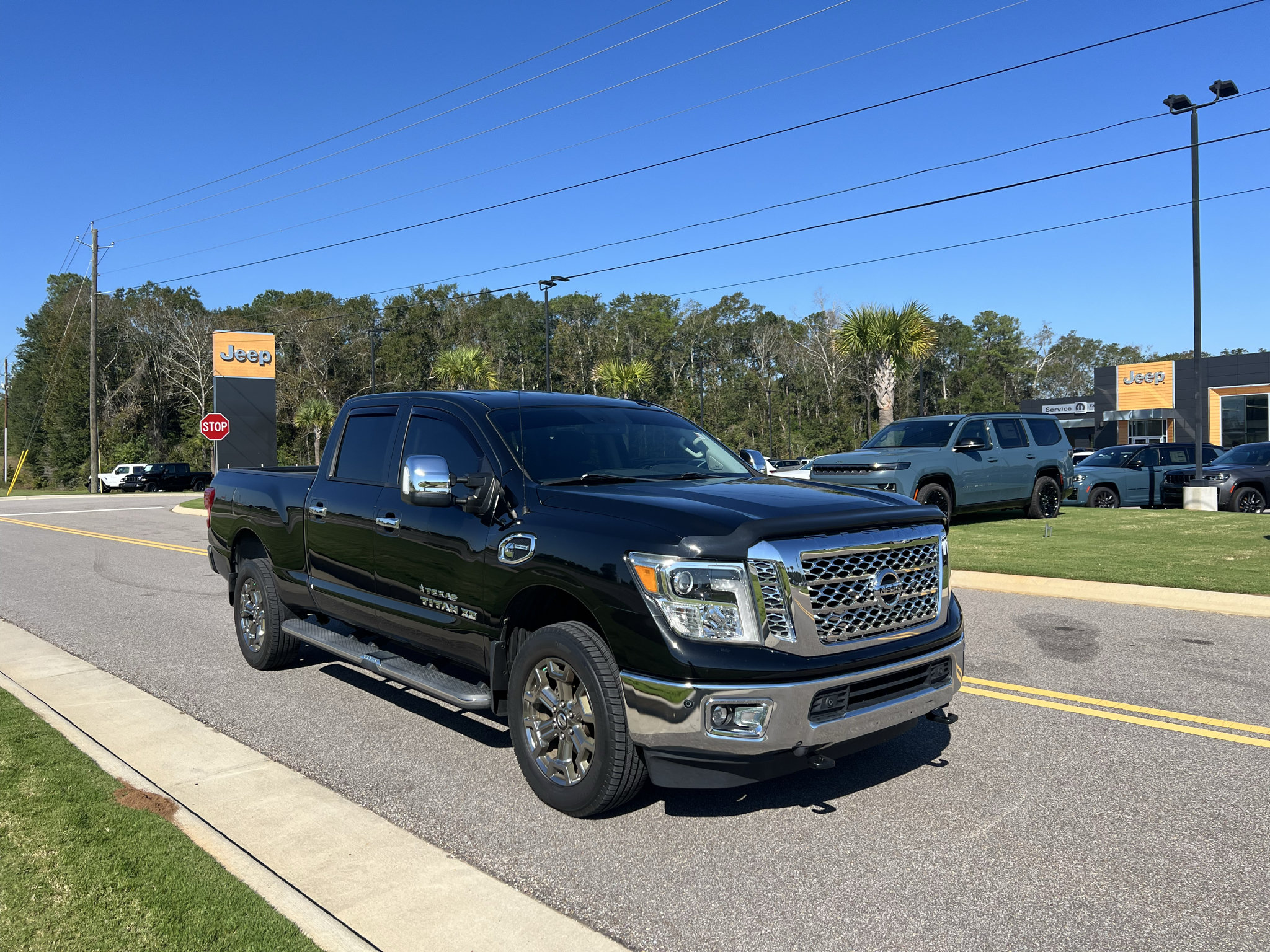 Used 2019 Nissan Titan SL w/ Chrome Package AWD/4WD image 1