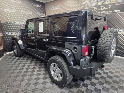 Used 2012 Jeep Wrangler Unlimited Rubicon w/ Dual Top Group image 9