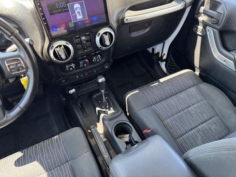 Used 2012 Jeep Wrangler Unlimited Sahara w/ Dual Top Group AWD/4WD image 28