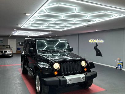 Used 2012 Jeep Wrangler Unlimited Sahara w/ Dual Top Group