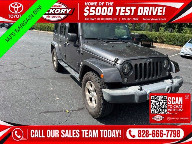 Used 2014 Jeep Wrangler Unlimited Sahara w/ Connectivity Group AWD/4WD image 1