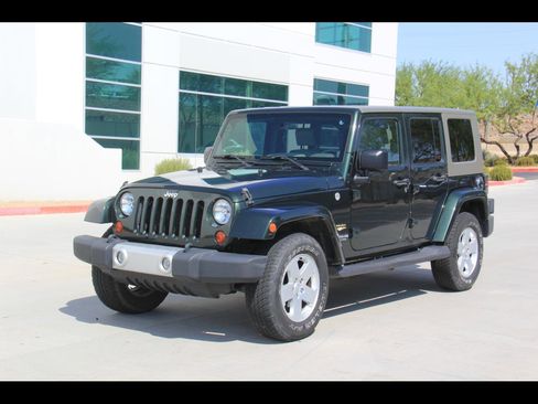 Used 2010 Jeep Wrangler Unlimited Sahara w/ Mopar Chrome Edition Group AWD/4WD image 1