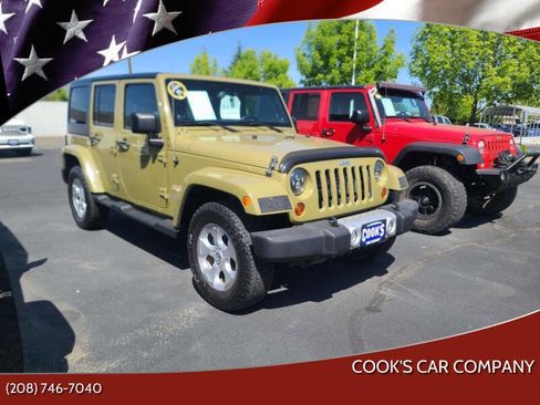 Used 2013 Jeep Wrangler Unlimited Sahara w/ Dual Top Group AWD/4WD image 1