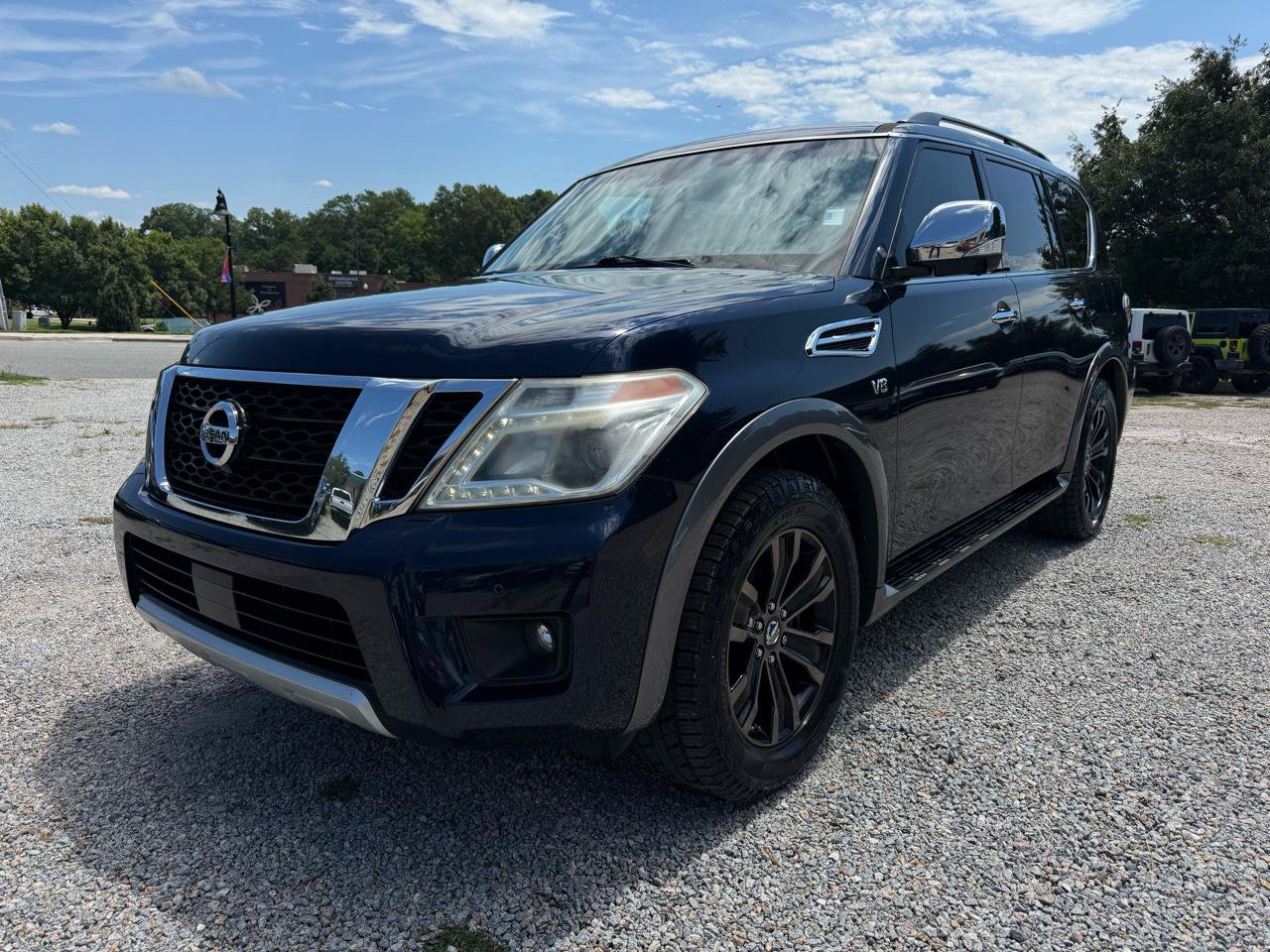 Used 2017 Nissan Armada Platinum w/ Captain Seat Package AWD/4WD image 1