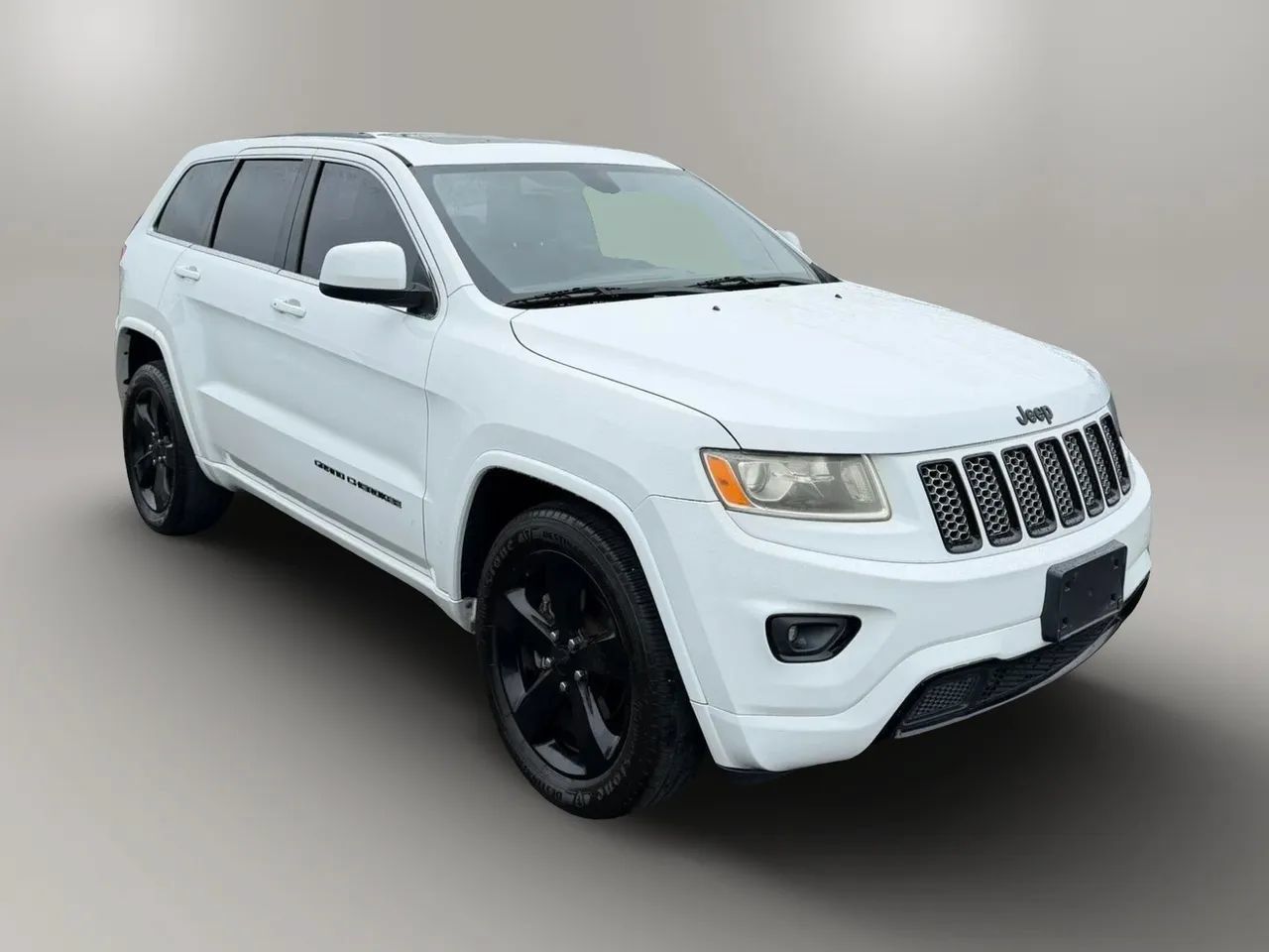 Used 2015 Jeep Grand Cherokee Altitude AWD/4WD image 1