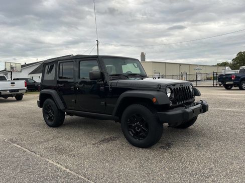 Used 2015 Jeep Wrangler Unlimited Sport image 1