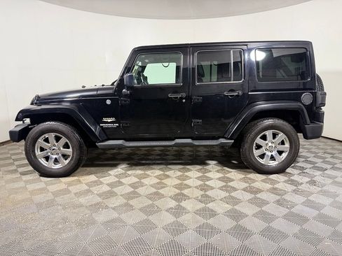 Used 2014 Jeep Wrangler Unlimited Sahara w/ Dual Top Group AWD/4WD image 3