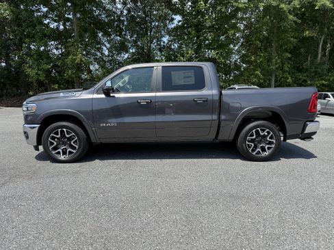 New 2026 RAM 1500 Laramie w/ Bed Utility Group AWD/4WD image 4