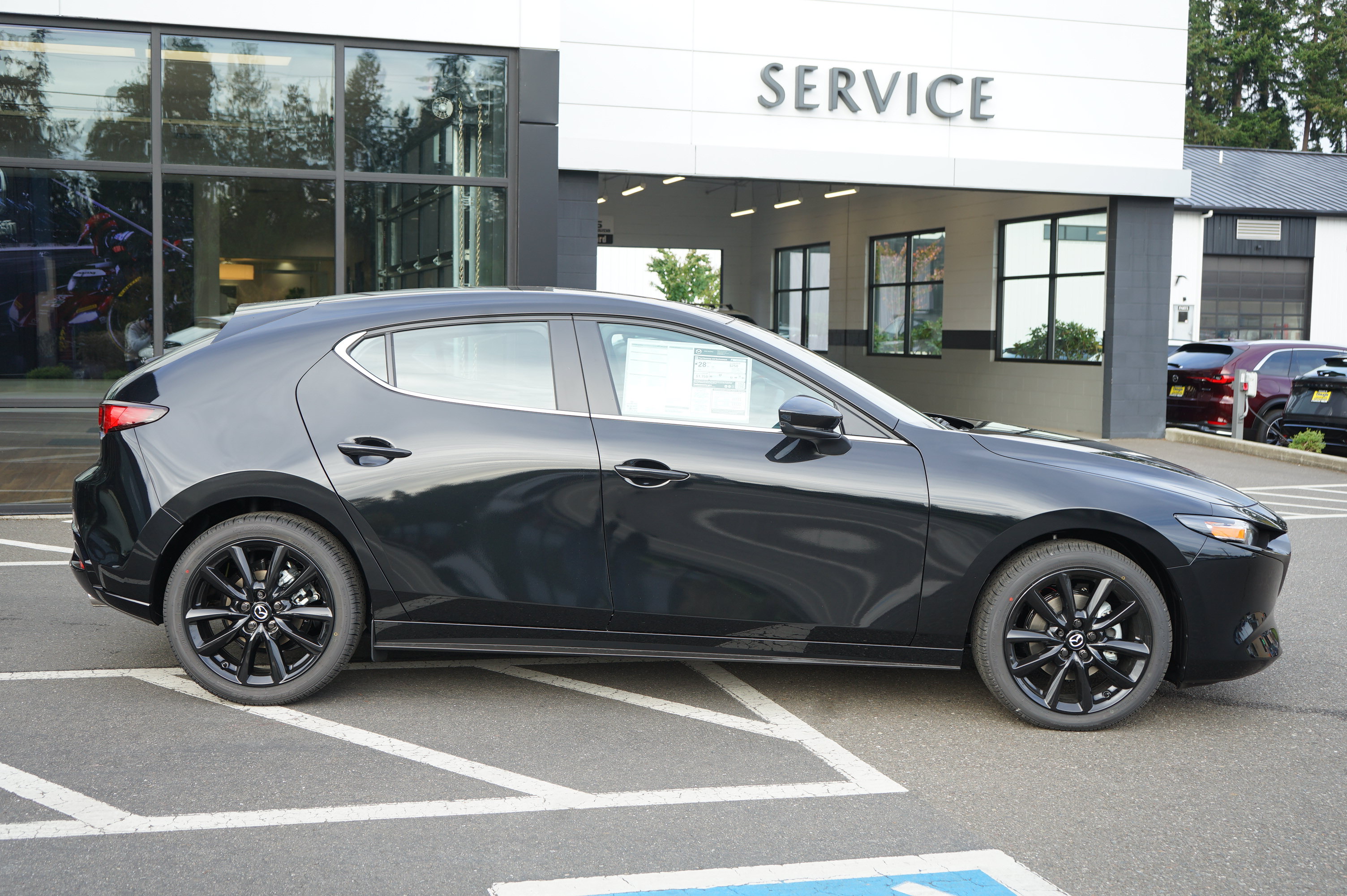 New 2026 MAZDA MAZDA3 Carbon AWD/4WD image 2