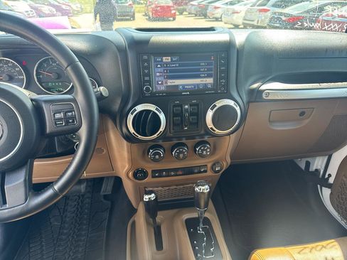 Used 2012 Jeep Wrangler Unlimited Sahara w/ Dual Top Group AWD/4WD image 10