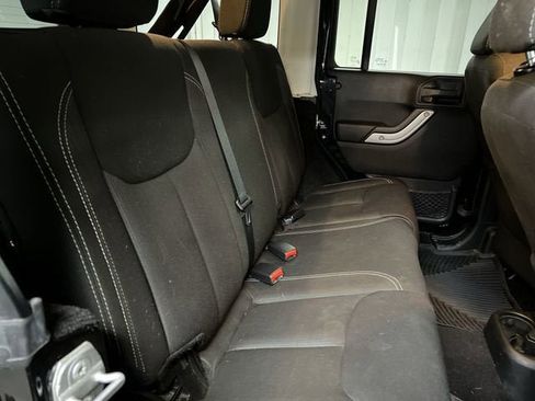 Used 2014 Jeep Wrangler Unlimited Sahara w/ Dual Top Group image 25