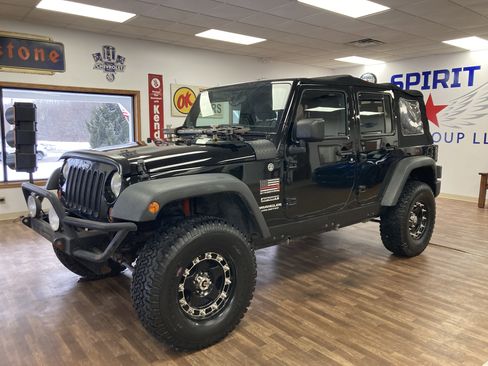Used 2012 Jeep Wrangler Unlimited Sport image 1