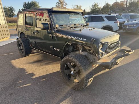 Used 2011 Jeep Wrangler Unlimited Rubicon w/ Dual Top Group AWD/4WD image 5
